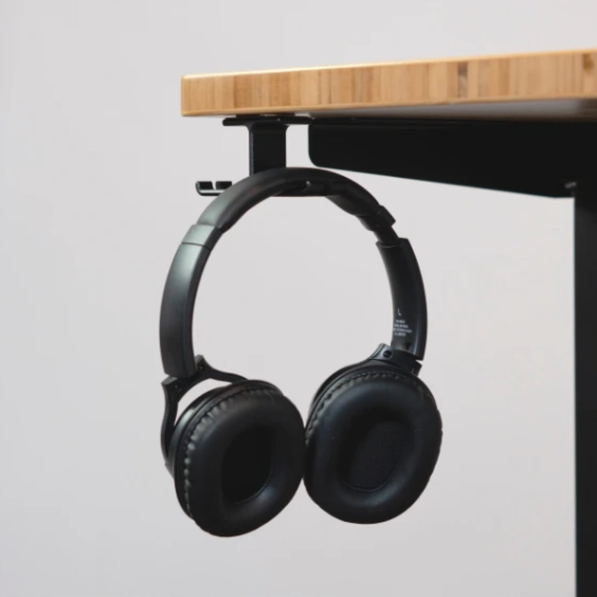 Headphone mount for online desk